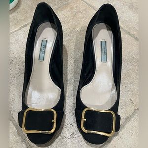 Prada trunk heels in black suede leather